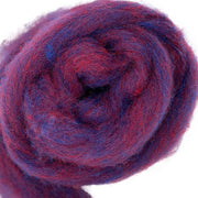 Bulky carded Corriedale wool roving in deep red-purple melange with flashes of blue, from the Tutti Frutti Series