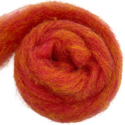 Bulky carded Corriedale wool roving in warm orange-red melange with amber and hot-pink tones, from the Tutti Frutti Series