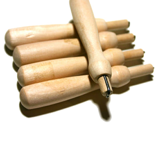 Wooden needle felting holders arranged on white background, single needle felting tools