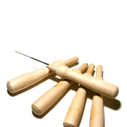 Wooden needle felting holders stacked on white background, single needle felting tools